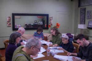 Volunteers grading the written tests
